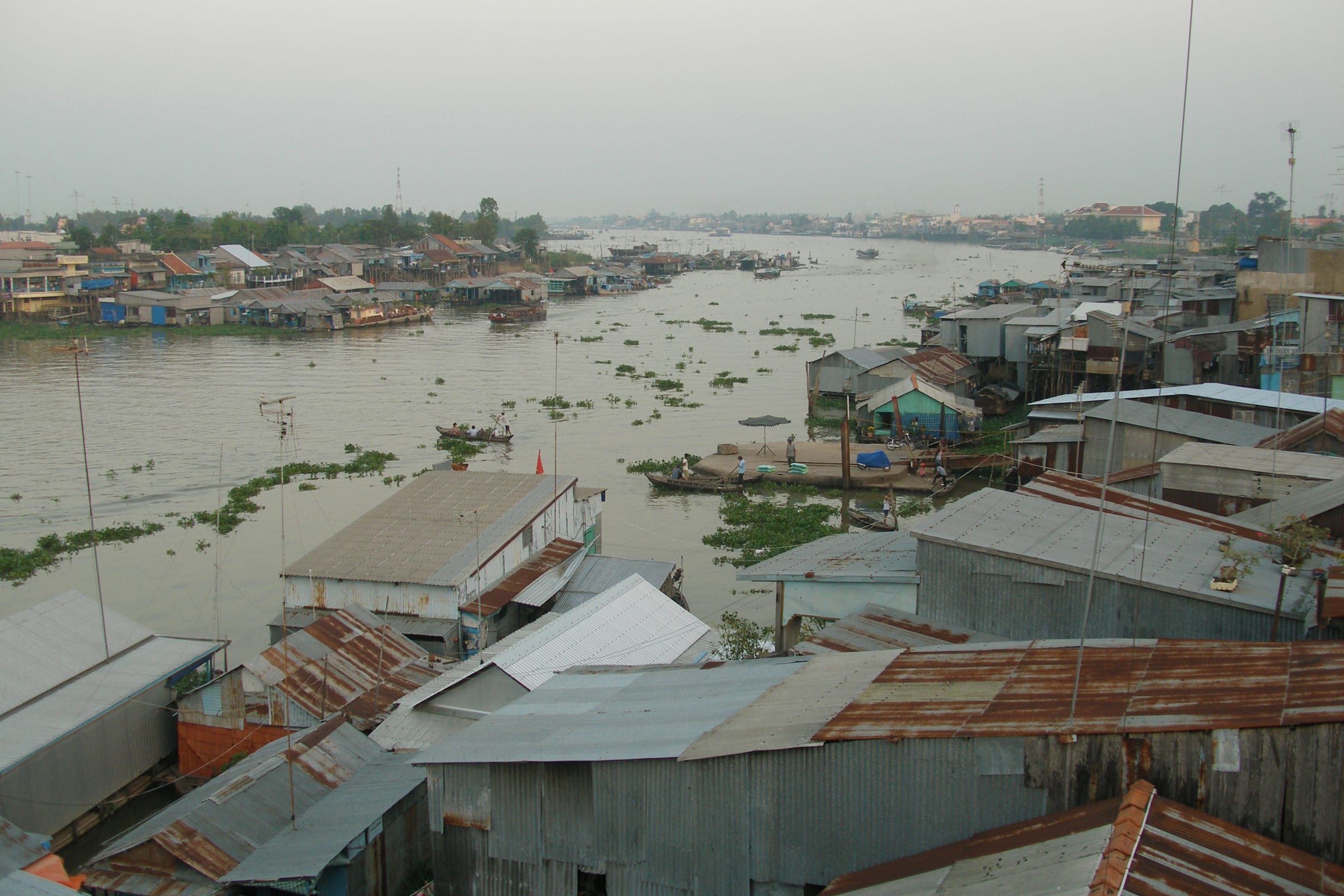 Floating houses and fish farms on the river at Chau Doc seen from above
