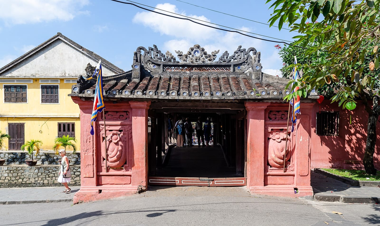 A yellow-washed old town house beside the Japanese Covered Bridge in Hoi An
