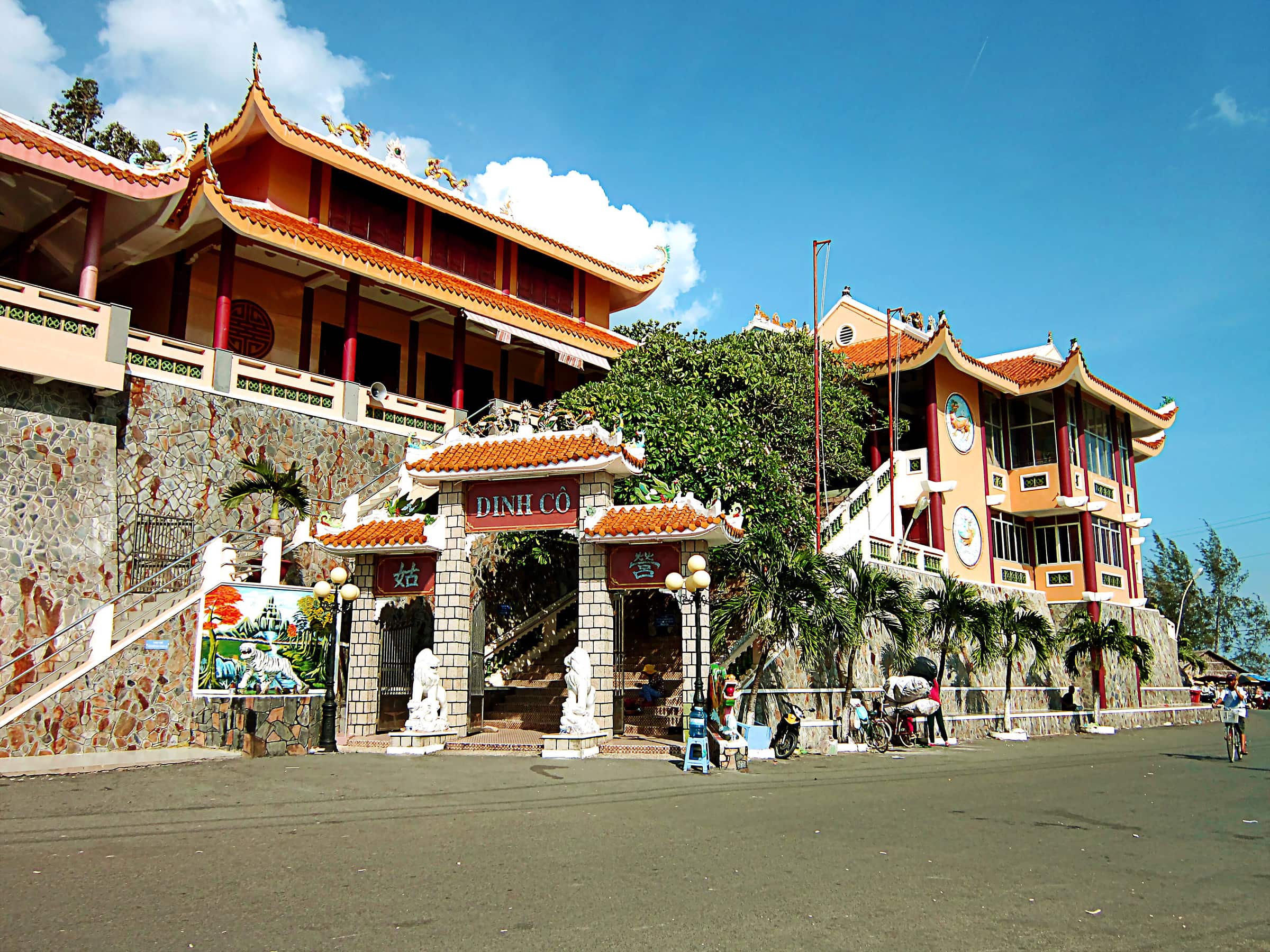 The red-roofed Dinh Co temple on the seafront at Long Hai