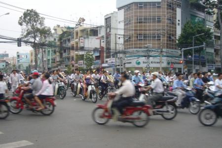 A busy street scene with motorbikes in Saigon